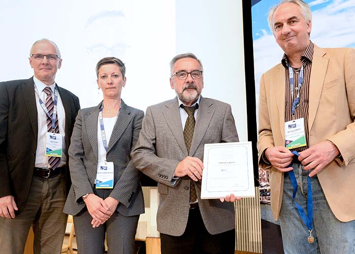 Gilbert Laporte (2nd from right), during the presentation of his award, with Marc Sevaux, Dolores Romero Morales and Matthias Ehrgott.