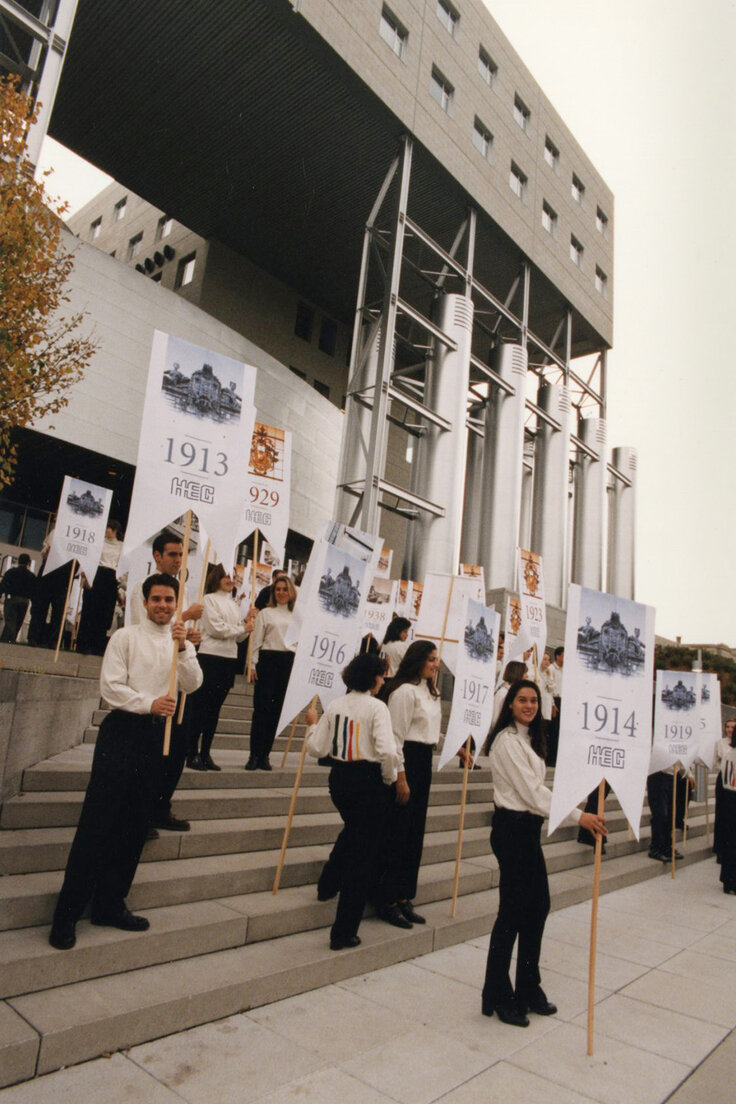 During the inauguration of the Côte-Sainte-Catherine building, HEC Montréal students display banners representing different years in the School’s history.