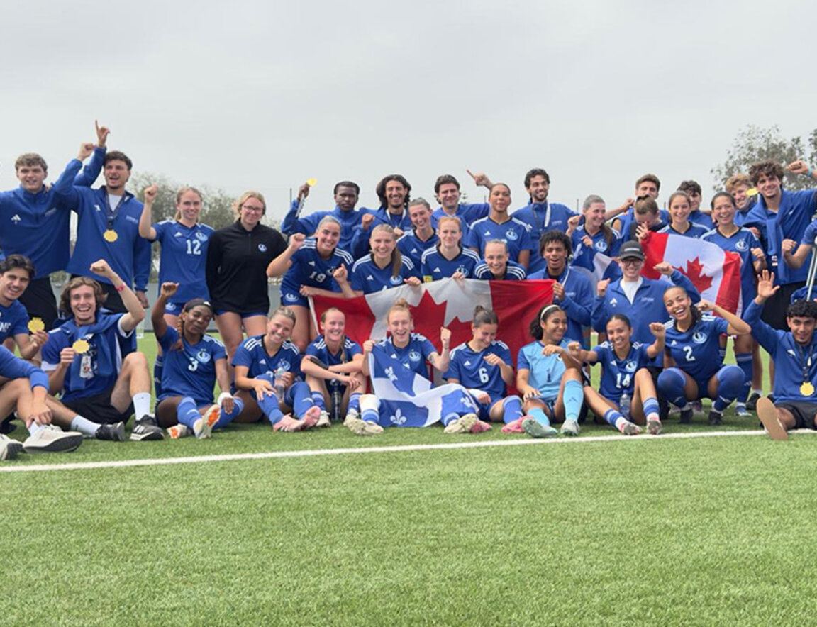 Two Carabins teams on a soccer field, wearing medals and posing with the flags of Canada and Quebec